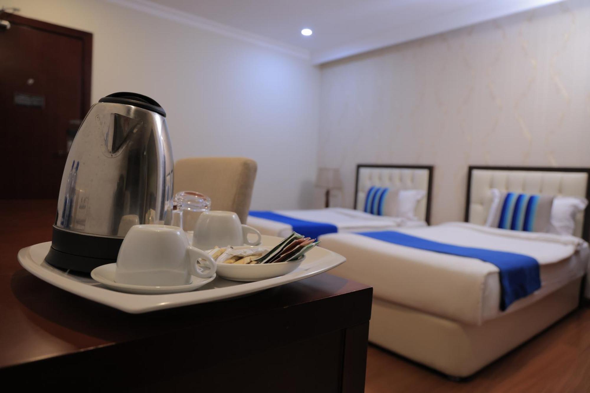 Tolip Olympia Hotel Аддис-Абеба Номер фото